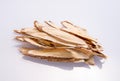 Chinese herbal medicines -- Astragalus on white background, blank for text Royalty Free Stock Photo