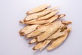 Chinese herbal medicines -- Astragalus on white background, blank for text Royalty Free Stock Photo