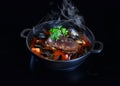 Chinese HotPot spicy soup base with crab and seafood Royalty Free Stock Photo