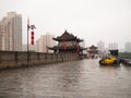 Chinese house stands on a bridge near Bicycle parking