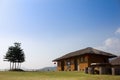 Chinese house with trees on top of mountain Royalty Free Stock Photo