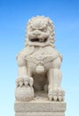 Chinese Imperial Lion Statue with sky Royalty Free Stock Photo