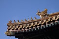 Chinese imperial roof decoration or roof charms, or roof figures with emperor and creatures in the Forbidden City in Beijing, Chin Royalty Free Stock Photo