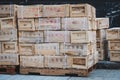 Chinese import, export goods in wooden boxes stacked on pallet Royalty Free Stock Photo