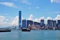 A Chinese junk ship in front of the Hong Kong skyline Royalty Free Stock Photo