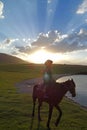 Chinese Kazakh herdsmen ride horse Royalty Free Stock Photo