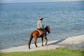 Chinese Kazakh herdsmen riding horse at Sailimu