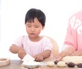 Chinese kids make moon cakes by themselves