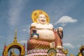 Chinese Laughing Buddha at Plai Laem Temple - Main Symbol and Popular Landmark of Samui Island in Thailand. Tourism and