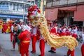 Chinese lion dancer and the old man performance in Chinese respect the gods celebration