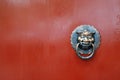 Chinese lion on red door Royalty Free Stock Photo