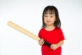 Chinese little girl holding baseball bat with angry expression