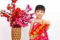 Chinese little girl pising holding Spring festival couplets