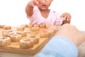 Chinese little girl is playing Chinese chess seriously Royalty Free Stock Photo