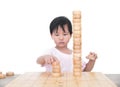 Chinese little girl playing with traditional Chinese chess pieces in front of white background Royalty Free Stock Photo