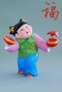 Chinese lucky clay figurine-great happiness(char) Royalty Free Stock Photo