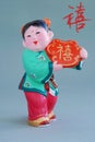 Chinese lucky clay figurine_lucky(char) Royalty Free Stock Photo
