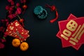 Chinese lunar new year decoration over black background. Royalty Free Stock Photo