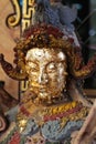 Chinese Male angel statue filled with gold leaf