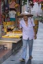 Chinese man carrying heavy load Royalty Free Stock Photo