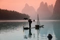 Chinese man fishing with cormorants birds