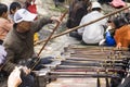 Chinese Man Playing Instrument