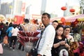 A Chinese man is selling candied fruit in the new year market