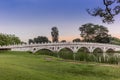 Chinese marble bridge temples reflecting in the lake in the Chin Royalty Free Stock Photo