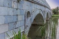 Chinese marble bridge temples reflecting in the lake in the Chin Royalty Free Stock Photo