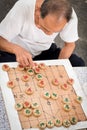 Chinese men playing chess outdoor