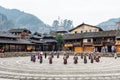 The Chinese miao women wearing traditional clothes and dancing in open opera house of Xijiang Qianhu Miao Village The One