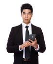Chinese mixed Indian businessman use of the cellphone Royalty Free Stock Photo