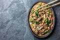 Chinese mongolian beef stir fry on iron plate Royalty Free Stock Photo