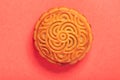 Chinese mooncake on red background by top view