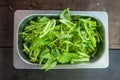 Chinese morning glory vegetable in the stainless cup ready for cooking Royalty Free Stock Photo
