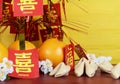 Chinese New Year celebration party table on red and yellow wood background. Royalty Free Stock Photo