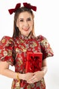 Chinese New Year concept, Woman holding Present Gift Box ,meaning to be happy healthy and wealthy year, Chinese New Year