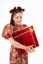 Chinese New Year concept, Woman holding red present gift box to give in Chinese New Year Celebration