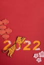 Chinese New Year. Decoration with traditional Chinese New Year motifs, cut out paper decorations on red cardboard background. Copy Royalty Free Stock Photo