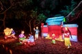 Chinese lantern sculptures depicting traditional Chinese house and family