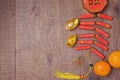 Chinese New Year decorations on wooden table background. View from above with copy space Royalty Free Stock Photo
