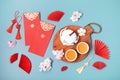 Chinese new year festival decoration over blue background. Traditional lunar new year flat lay Royalty Free Stock Photo