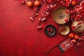 Chinese New Year festival decorations, mandarins, flowers, envelopes . Flat lay, top view. AI Generated Royalty Free Stock Photo