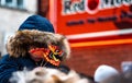 Chinese new year festival parade kid focus crowd play emblem paper head cute chinatown uk manchester