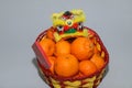 Chinese New Year mandarin oranges in basket decorate with Chinese dragon, Spring festival,ang pao Royalty Free Stock Photo