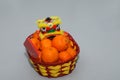 Chinese New Year mandarin oranges in basket decorate with Chinese dragon, Spring festival,ang pao Royalty Free Stock Photo