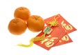 Chinese New Year ornament, oranges and red packets Royalty Free Stock Photo