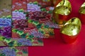 Chinese New Year packet with Chinese Gold Ingots on red background. Copy space and Chinese new year decoration concept. Royalty Free Stock Photo