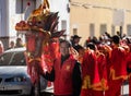 Chinese New Year parade in Usera neighborhood, Madrid. Spain. Traditional Chinese dragon carried by several people in traditional