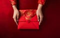 Chinese new year poster. Hands in red clothes holding a gift box, top view, AI Generative